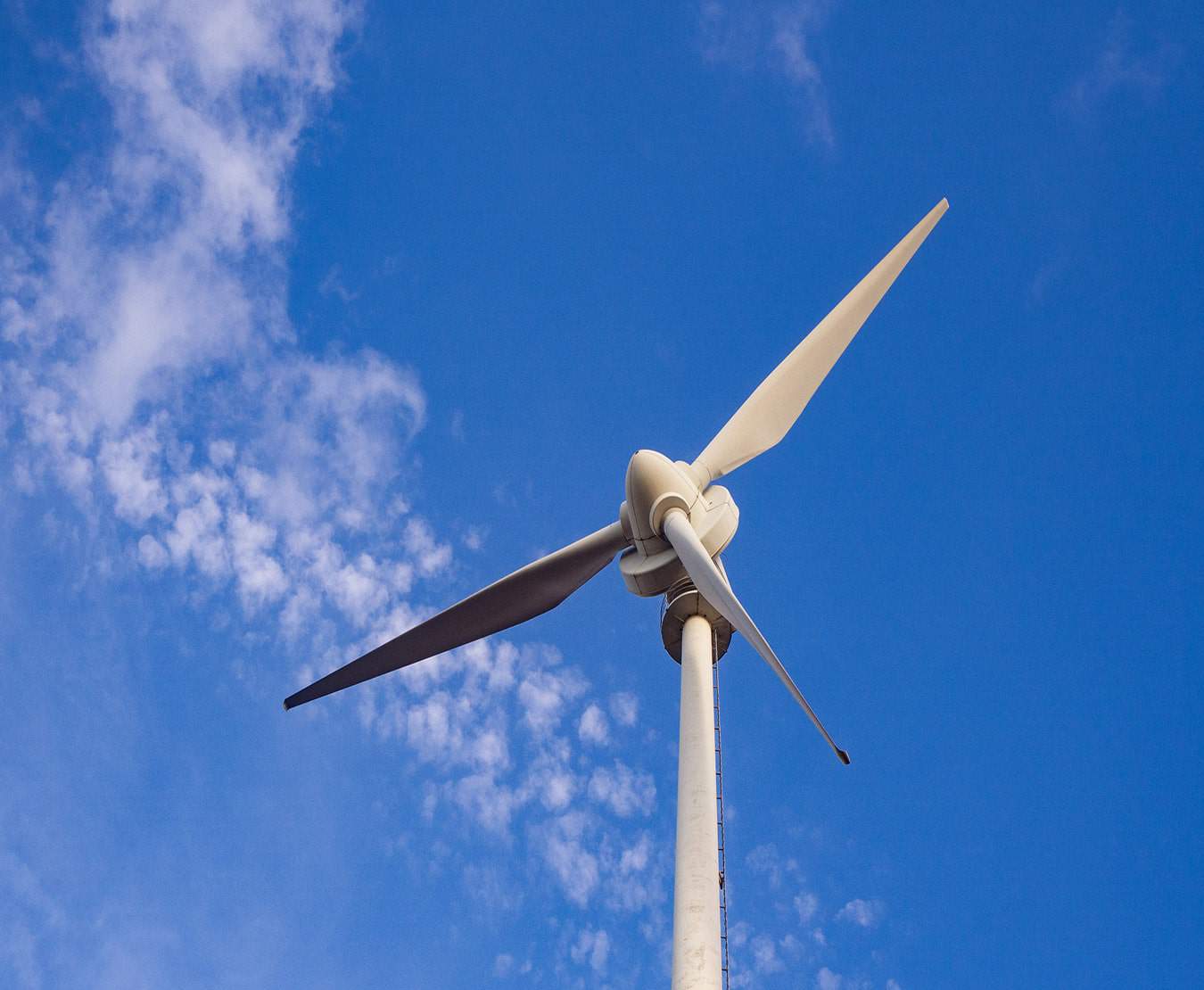 wind turbine against a blue sky